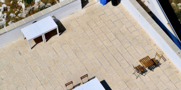 Trasformazione del astrico solare in terrazzo in condominio: come farlo